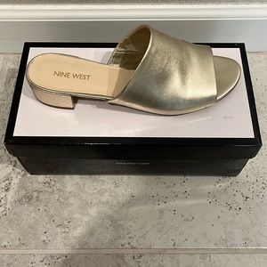 Nine West gold slides. Size 8.5. Great condition. Stored in box